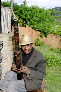 Musician with Valiha, a traditional Malagasy instrument