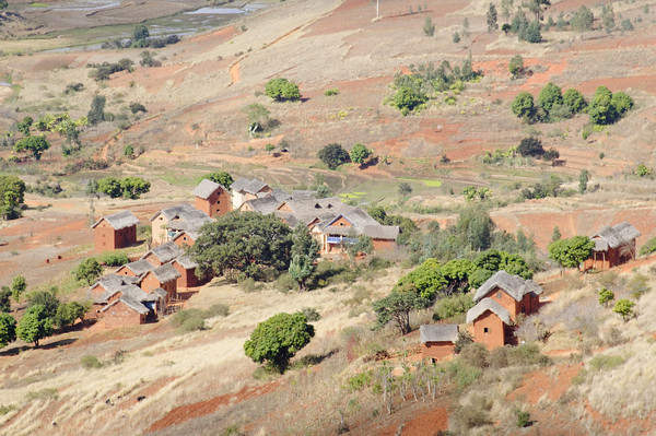 Landscape with red houses